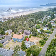 Spacious coastal retreat | 3-min walk to beach | Decks & mountain views
