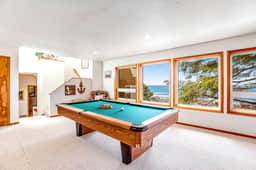 Limited Time Deals Coastal Hideaway with Ocean Views and Spacious Deck - Image 5