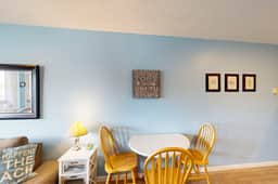 Creekside condo with beach access balcony full kitchen and ocean views - Image 5