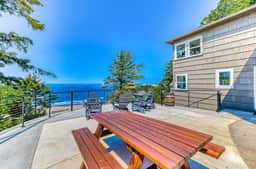 Quaint ocean view escape with modern interior smart TV and gorgeous deck - Image 3