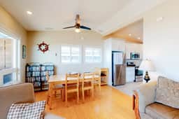 Beachfront home with ocean facing deck and ocean views throughout modern kitchen - Image 3