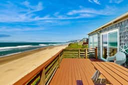 Ocean front home with spacious deck and beach access near shops and restaurants - Image 3