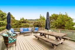Dog friendly home across street from beach with rooftop deck and views - Image 2