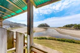 Dog friendly oceanfront condo with beach access and Proposal Rock view - Image 4