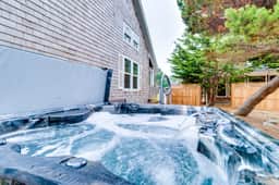 Sunny Beach House with Private Hot Tub Firepit and Tons of Space Dogs OK - Image 2