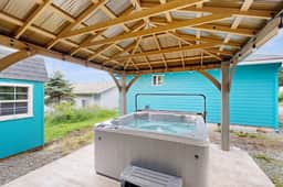 Modern Beach Cottage with a covered patio fire pit grill and easy beach access - Image 4
