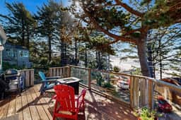 Charming home with wonderful ocean views ping pong game room WiFi decks - Image 2