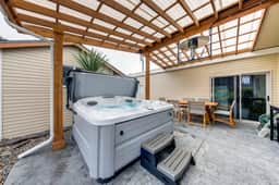 Snazzy home near the beach with private hot tub patio and grill - Image 2