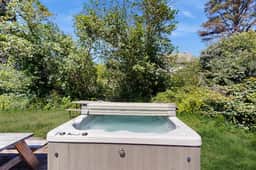 Expansive family friendly home with a private hot tub walk to the beach - Image 2