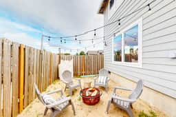 Stunning home with fireplace firepit and central AC short walk to the beach - Image 2