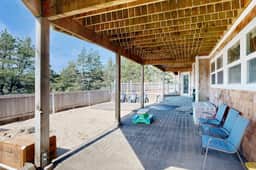 Coastal estate with private hot tub enclosed yard firepit and game room - Image 4