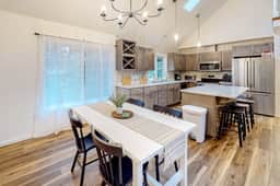 Renovated three story home by the beach with a furnished deck and washer dryer - Image 3