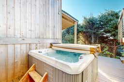 Dog Friendly Coastal Retreat with Water Views Deck Private Hot Tub and WiFi - Image 2