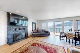 Bayview home with a deck overlooking the locally famous Ghost Hole fishing spot - Image 3