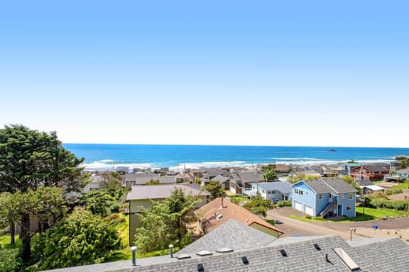 Limited Time Deals Coastal Hideaway with Ocean Views and Spacious Deck - Image 2