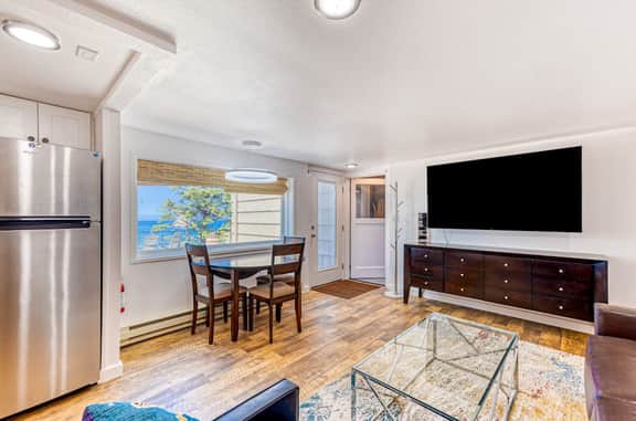 Quaint ocean view escape with modern interior smart TV and gorgeous deck - Image 2