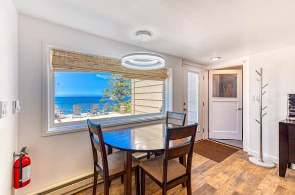 Quaint ocean view escape with modern interior smart TV and gorgeous deck - Image 4