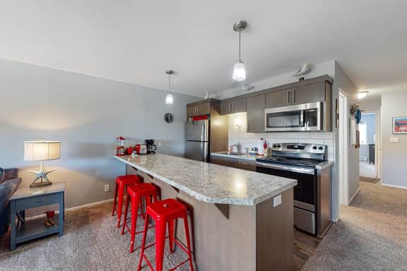 Third floor beachfront condo with a balcony full kitchen and ocean views - Image 5