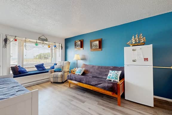 Dog friendly oceanfront condo with beach access and Proposal Rock view - Image 2