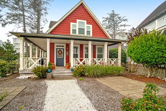 Romantic Oregon Coast Escape with Porch, Fireplace & Garden Charm - Image 1