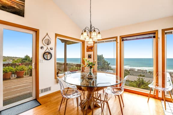 Limited Time Deals Coastal Hideaway with Ocean Views and Spacious Deck - Image 1