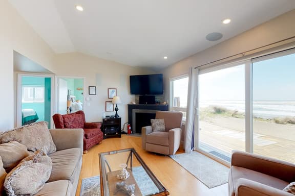 Beachfront home with ocean facing deck and ocean views throughout modern kitchen - Image 1