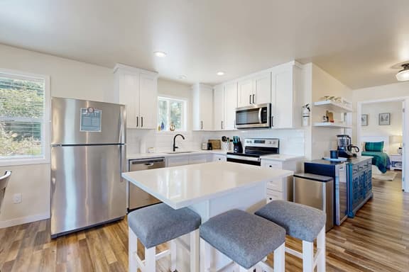 Modern Beach Cottage with a covered patio fire pit grill and easy beach access - Image 1