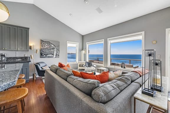 Remodeled home with multiple decks and ocean views short walk to beach - Image 1