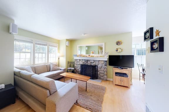 Dog friendly beach house with private hot tub free WiFi game room and ocean views - Image 1