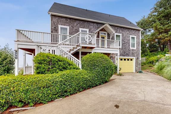 Ocean view home with hot tub game room furnished deck and fireplaces - Image 1