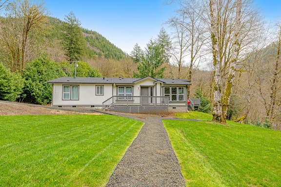 Dog friendly waterfront home on the Wilson River with great views deck and WiFi - Image 1