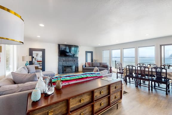 Bayview home with a deck overlooking the locally famous Ghost Hole fishing spot - Image 1